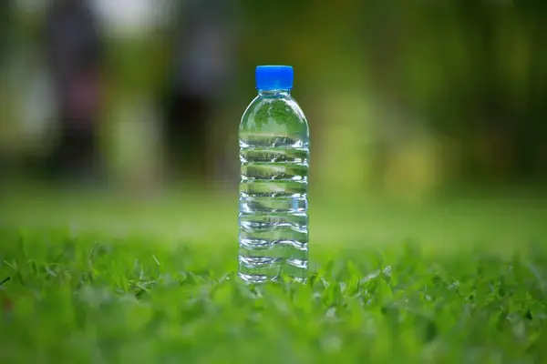 Water bottles of different sizes lined up showing height differences from 8 oz to 64 oz